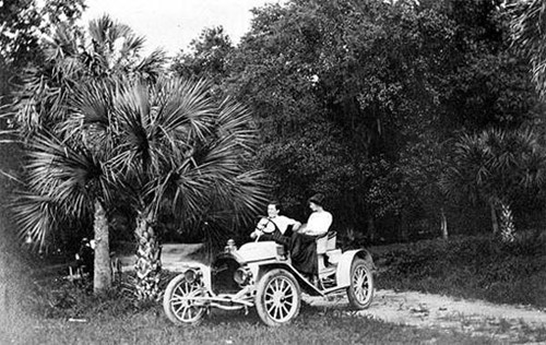 Early 19th century photo of a couple in a Buick automobile