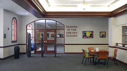 Front doors and waiting area outside of the Friends of the Library Gallery